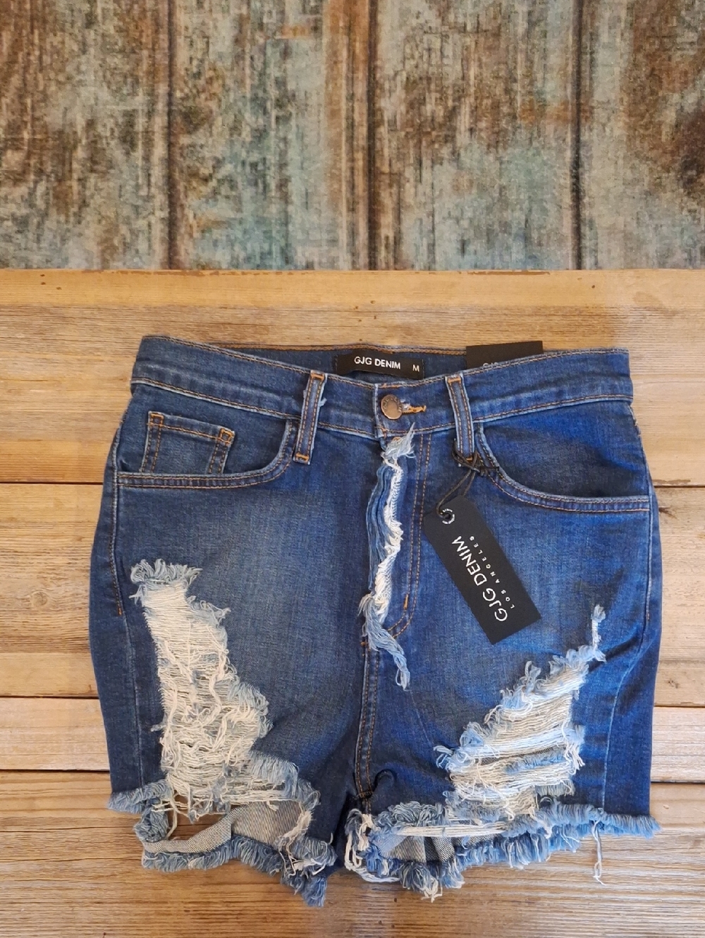 GJG Denim Women's Distressed Dark Blue Jean Shorts. Size Medium